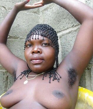 Insane African prostitute posing..