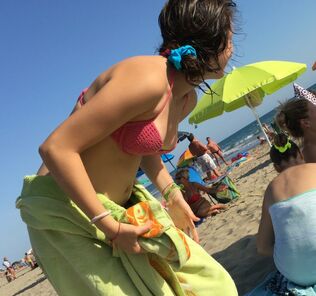 Candid nubile Beach nipple glide